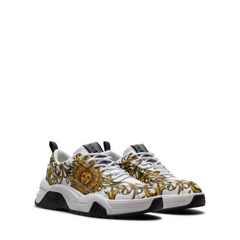 Scarpe da uomo di Versace Jeans Couture su FARFETCH